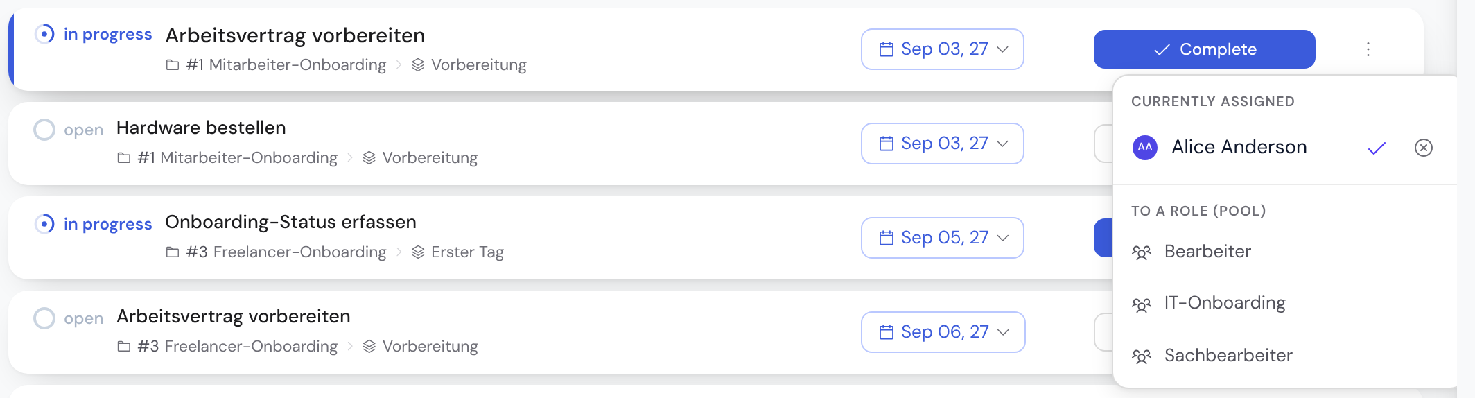 Assignee picker open at the task row's three-dot menu: assign to me, people, to a role, remove assignment